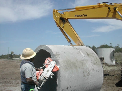 Beveling a Piece of Cut Concrete Pipe to Prepare for Installation into an A•LOK X•CEL Connector